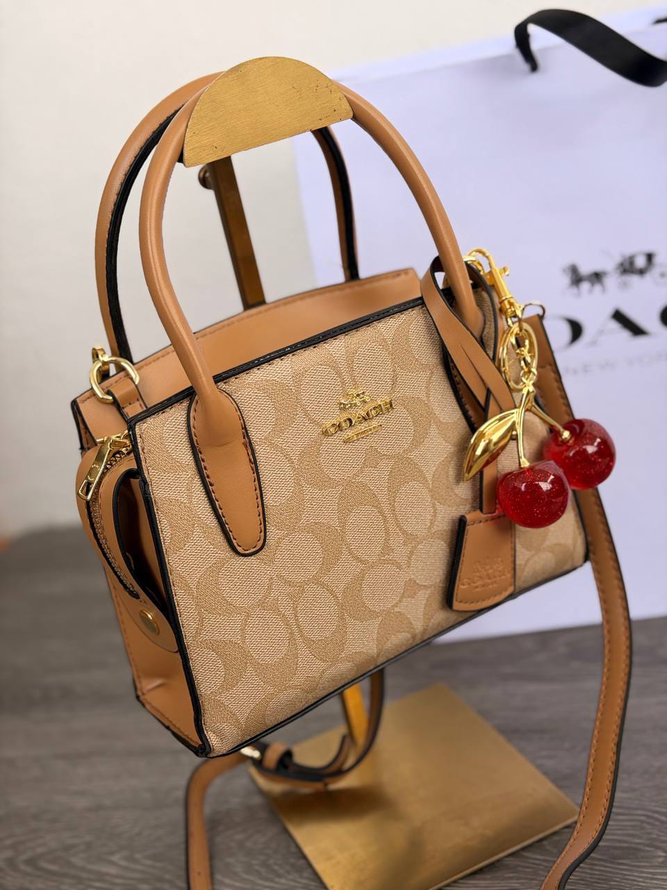 CARTERA MINI COACH CARAMEL