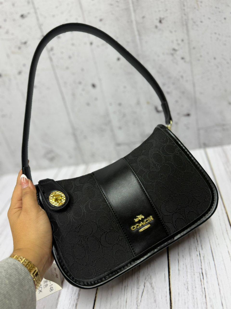 Cartera Aura coach