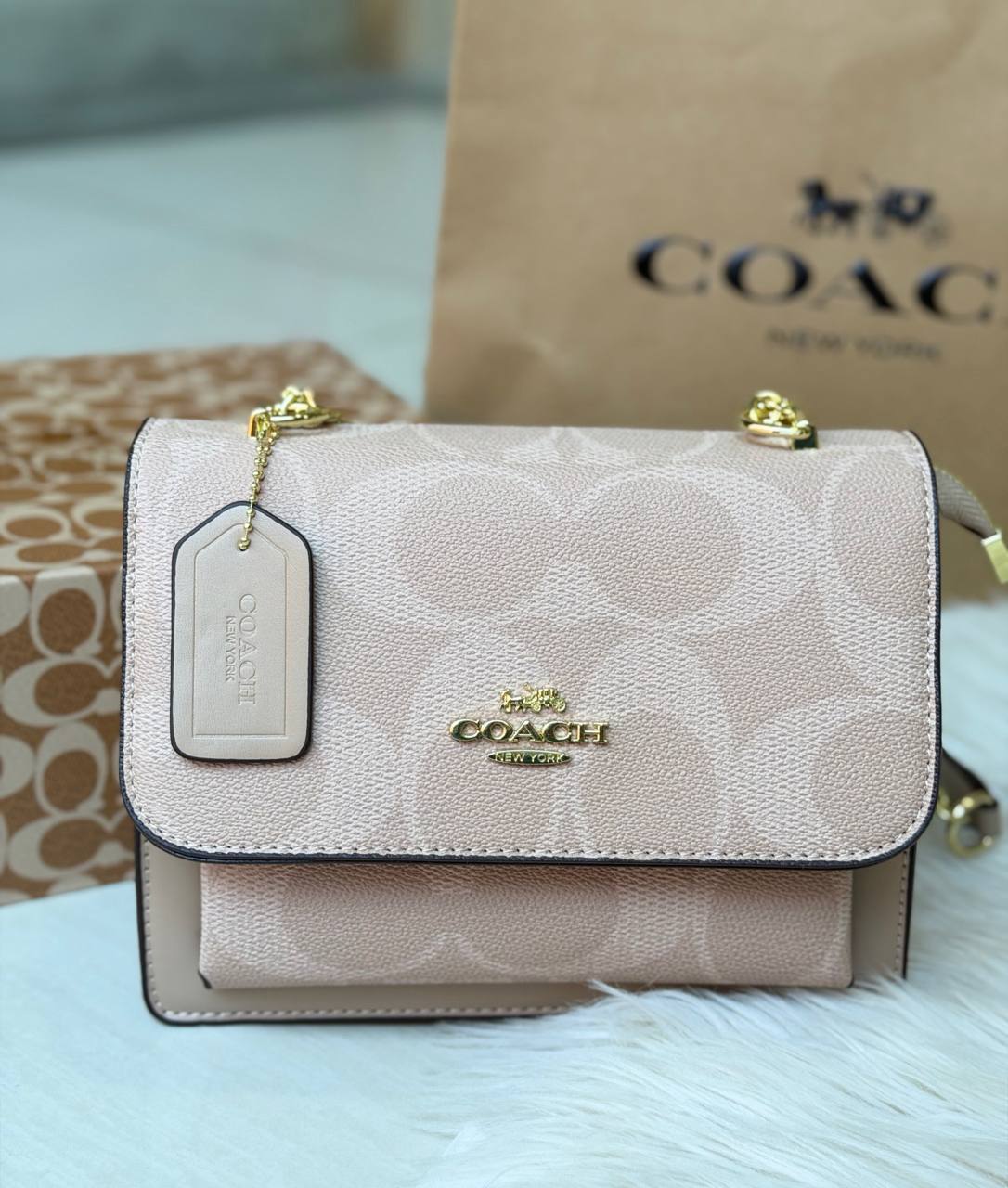 CARTERA KLARE COACH