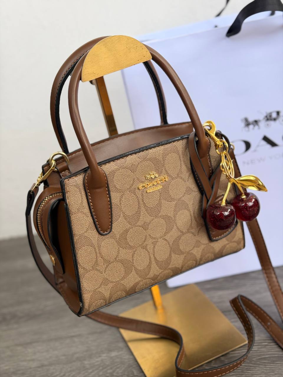 CARTERA MINI COACH CARAMEL